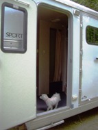 Missy in doorway of new trailer