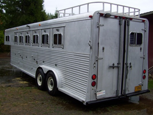 10/13/12 This trailer will hold 6 horses. It does not have a living or camping area, just saddle storage.